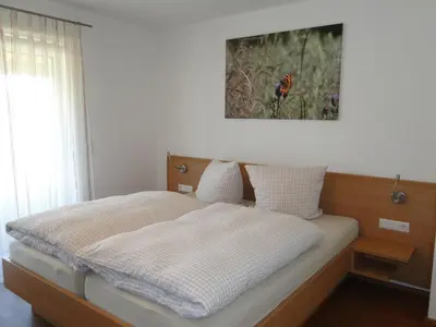 Ein Bett oder Betten in einem Zimmer der Unterkunft Ferienwohnung 2 in den Krautgärten
