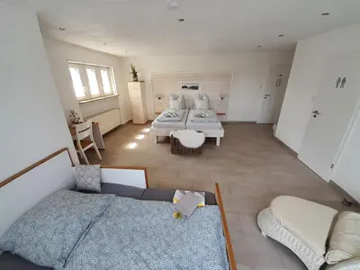 Ein Bett oder Betten in einem Zimmer der Unterkunft Pension Zweite Heimat