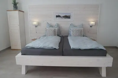 Ein Bett oder Betten in einem Zimmer der Unterkunft Pension Zweite Heimat