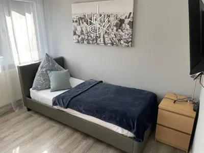 Ein Bett oder Betten in einem Zimmer der Unterkunft Work & Study Apartment