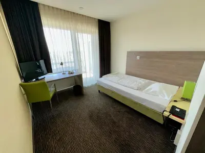 Ein Bett oder Betten in einem Zimmer der Unterkunft Gästehaus Fernblick
