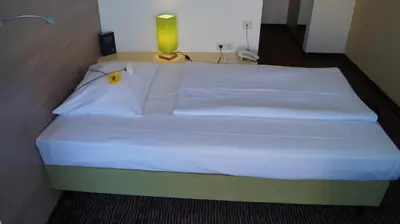 Ein Bett oder Betten in einem Zimmer der Unterkunft Gästehaus Fernblick