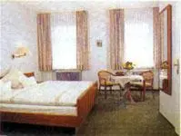 Ein Bett oder Betten in einem Zimmer der Unterkunft Gasthof Anker