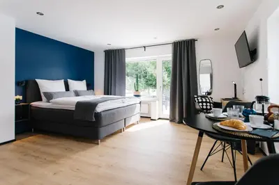 Ein Bett oder Betten in einem Zimmer der Unterkunft Ferienwohnungen Schranz GbR