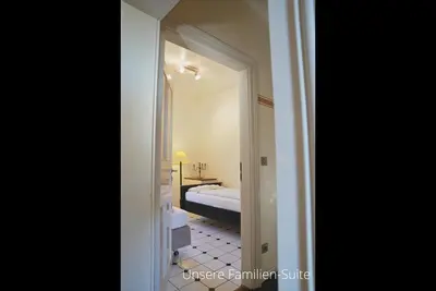 Ein Bett oder Betten in einem Zimmer der Unterkunft Das Lamm Heidelberg