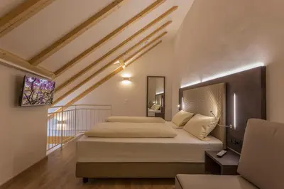 Ein Bett oder Betten in einem Zimmer der Unterkunft Hotel Jakobslust