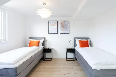 Ein Bett oder Betten in einem Zimmer der Unterkunft STAY@MA Boardinghouse Mannheim