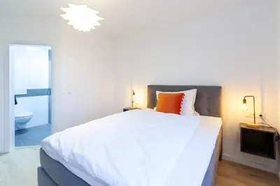 Ein Bett oder Betten in einem Zimmer der Unterkunft STAY@MA Boardinghouse Mannheim