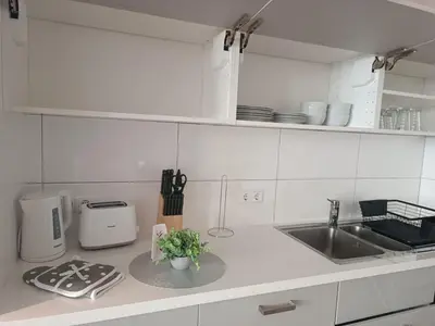 Küche/Küchenzeile in der Unterkunft L8 Street - Gneisenaustraße 9