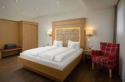 Ein Bett oder Betten in einem Zimmer der Unterkunft Ringhotel Winzerhof