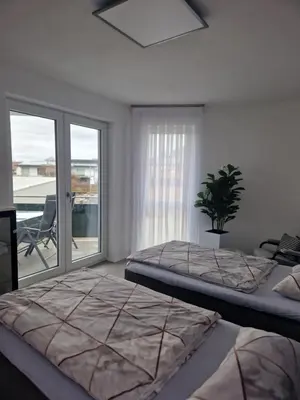 Ein Bett oder Betten in einem Zimmer der Unterkunft Ferienwohnung Alona