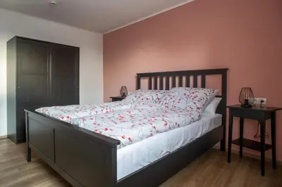Ein Bett oder Betten in einem Zimmer der Unterkunft Bio Weinhaus Krauss Zellertal