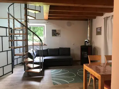 Ein Sitzbereich in der Unterkunft Bio Weinhaus Krauss Zellertal