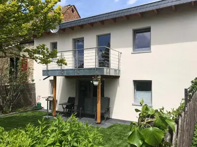 Ein Garten an der Unterkunft Bio Weinhaus Krauss Zellertal