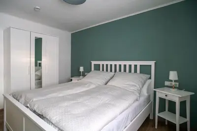 Ein Bett oder Betten in einem Zimmer der Unterkunft Bio Weinhaus Krauss Zellertal