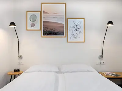 Ein Bett oder Betten in einem Zimmer der Unterkunft smartments Mannheim Hauptbahnhof