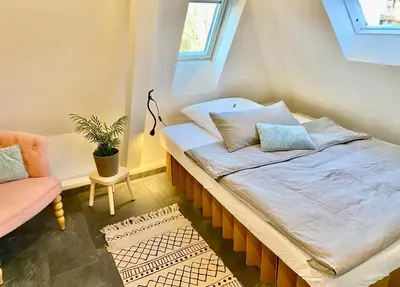 Ein Bett oder Betten in einem Zimmer der Unterkunft Apt8 - Ferienwohnung Brötzingen DG