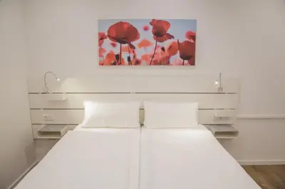 Ein Bett oder Betten in einem Zimmer der Unterkunft Main Motel