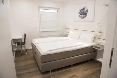 Ein Bett oder Betten in einem Zimmer der Unterkunft Main Motel