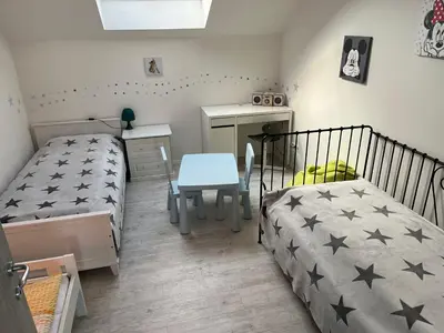 Ein Bett oder Betten in einem Zimmer der Unterkunft La Casa di Gino