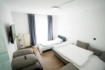 Ein Bett oder Betten in einem Zimmer der Unterkunft AP Hotel Mannheim Viernheim