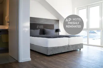 Ein Bett oder Betten in einem Zimmer der Unterkunft AP Hotel Mannheim Viernheim