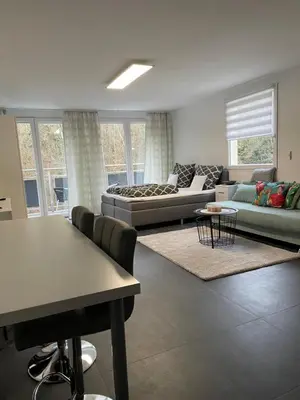 Ein Sitzbereich in der Unterkunft Ferienwohnung mit Waldblick