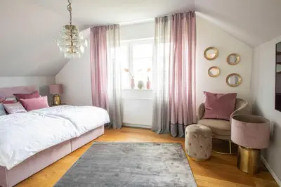 Ein Bett oder Betten in einem Zimmer der Unterkunft Adlerlodge - Ferienhaus