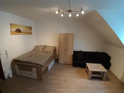 Ein Bett oder Betten in einem Zimmer der Unterkunft A23 Apartment in Abstatt am Stadtkern