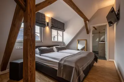 Ein Bett oder Betten in einem Zimmer der Unterkunft Hotel zur Krone