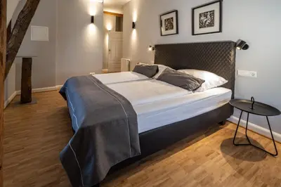 Ein Bett oder Betten in einem Zimmer der Unterkunft Hotel zur Krone
