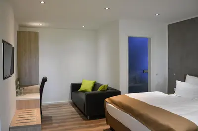 Ein Bett oder Betten in einem Zimmer der Unterkunft Hotel-Restaurant Kölbl