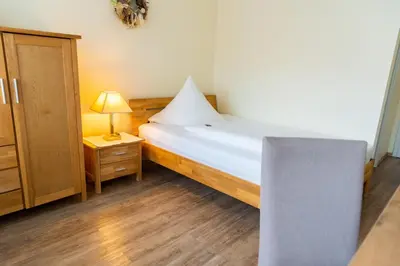 Ein Bett oder Betten in einem Zimmer der Unterkunft Hotel Bad Dürkheim