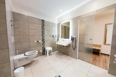 Ein Badezimmer in der Unterkunft Weingut Sandwiese Winzerhotel