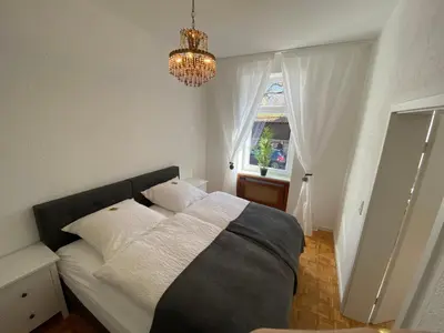 Ein Bett oder Betten in einem Zimmer der Unterkunft Stadtwohnung im Grünen