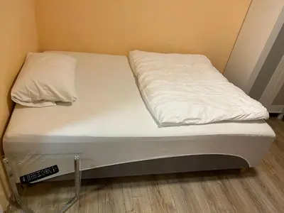 Ein Bett oder Betten in einem Zimmer der Unterkunft Relax Hotel-Ludwigshafen