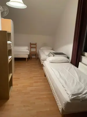 Ein Bett oder Betten in einem Zimmer der Unterkunft Relax Hotel-Ludwigshafen
