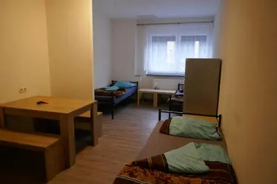 Ein Bett oder Betten in einem Zimmer der Unterkunft Zum Hexenhäusle