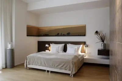 Ein Bett oder Betten in einem Zimmer der Unterkunft Weinhaus Henninger