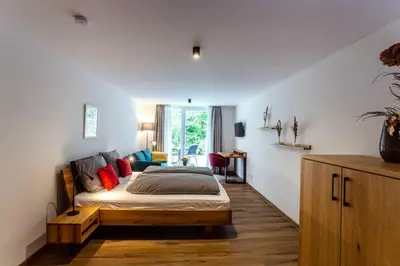 Ein Bett oder Betten in einem Zimmer der Unterkunft Siegelsbacher Mühle