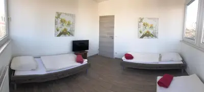 Ein Bett oder Betten in einem Zimmer der Unterkunft Pension Gästehaus Kautz