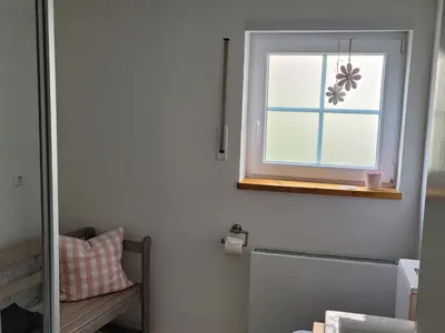 Ein Bett oder Betten in einem Zimmer der Unterkunft Ferienwohnung Kraichgaublick