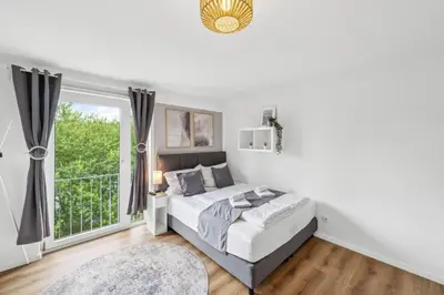 Ein Bett oder Betten in einem Zimmer der Unterkunft Go2Cozy - Study & Work Apartments - WIFI - Kitchen