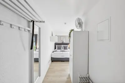 Ein Bett oder Betten in einem Zimmer der Unterkunft Go2Cozy - Study & Work Apartments - WIFI - Kitchen