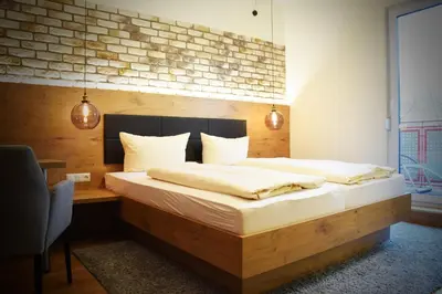 Ein Bett oder Betten in einem Zimmer der Unterkunft Gasthof zur Krone