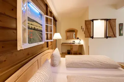 Ein Bett oder Betten in einem Zimmer der Unterkunft Gasthof zur Krone