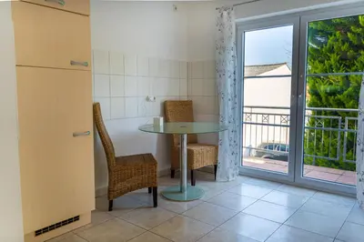 Ein Balkon oder eine Terrasse in der Unterkunft 153 m² Haus mit 6 Schlafzimmern für 12 Persoen