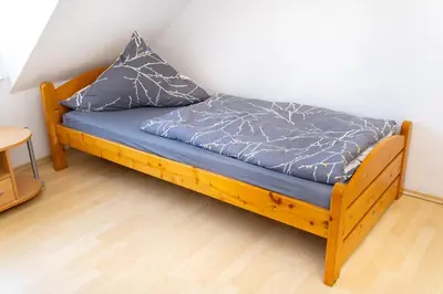 Ein Bett oder Betten in einem Zimmer der Unterkunft 153 m² Haus mit 6 Schlafzimmern für 12 Persoen