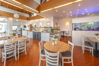 Ein Restaurant oder anderes Speiselokal in der Unterkunft Hotel Gasthof Zum Rössle