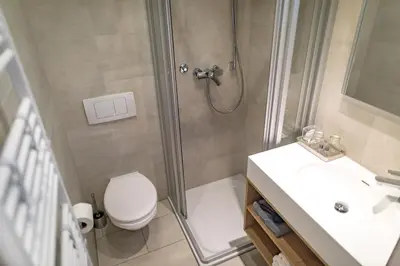 Ein Badezimmer in der Unterkunft Hotel Lehn